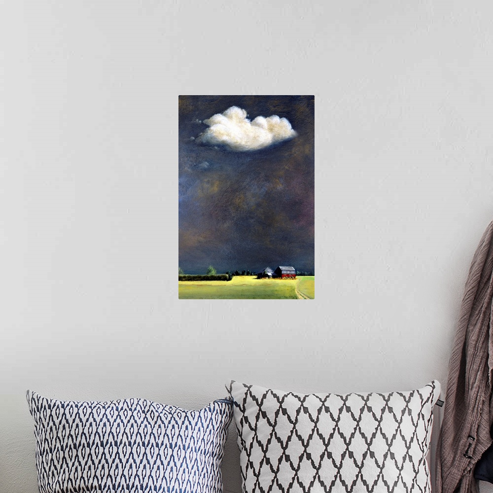 A bohemian room featuring Painting of a farm surround by a field with a large open sky and a single white cloud.