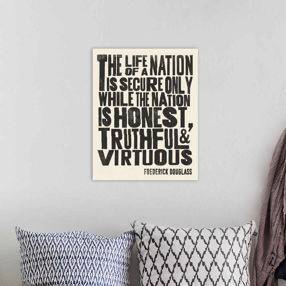 A bohemian room featuring Frederick Douglass Quote II