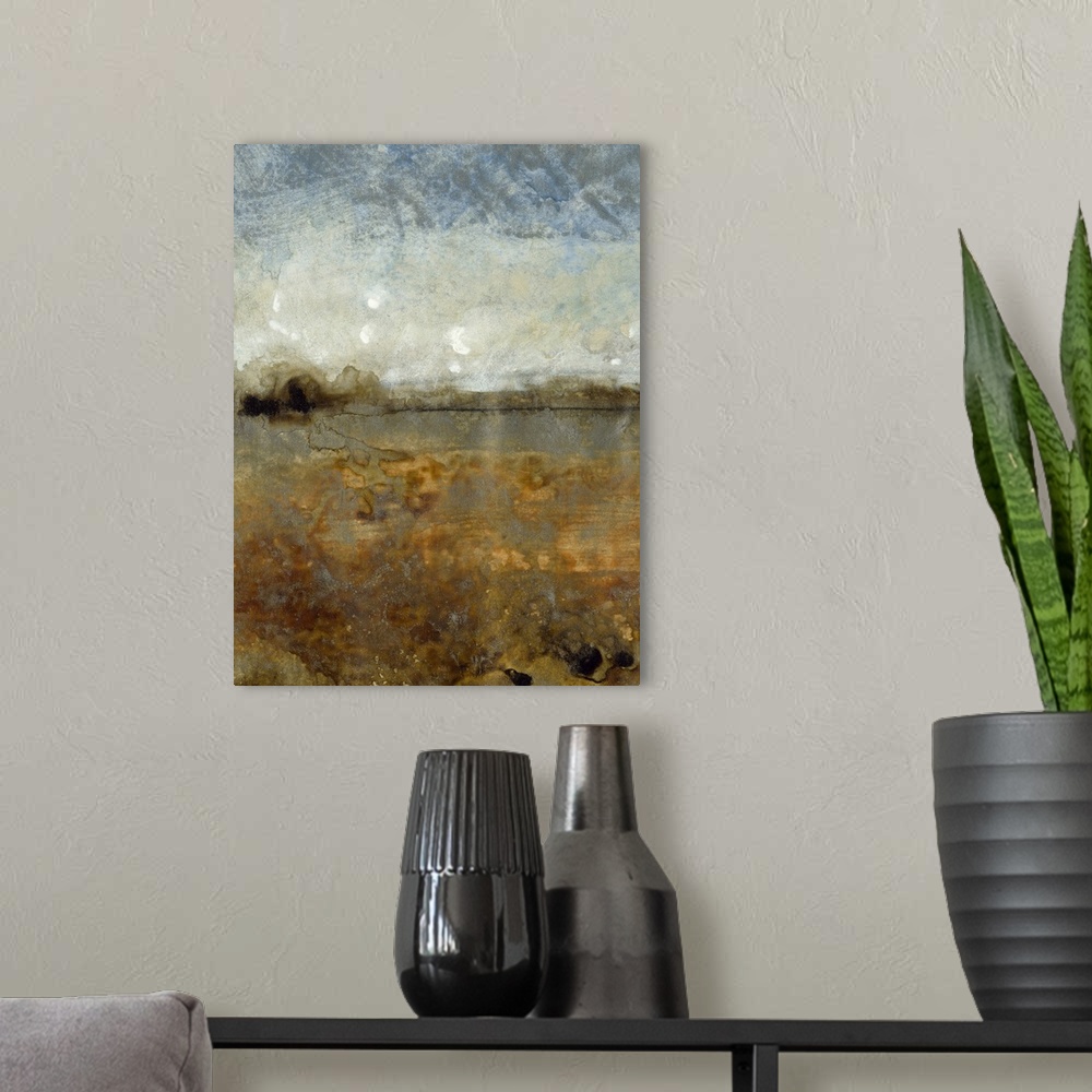 A modern room featuring Contemporary abstract painting of what resembles an earthy toned landscape.