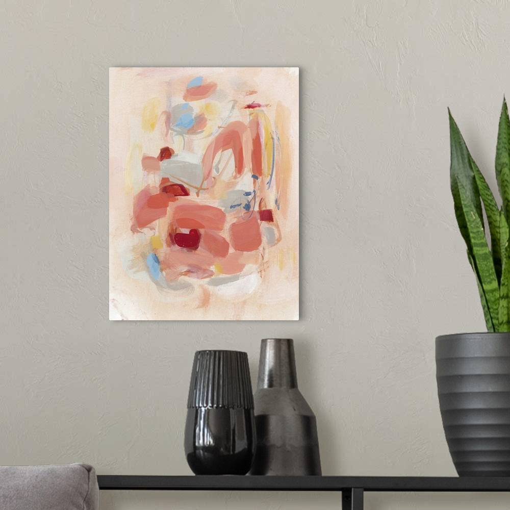 A modern room featuring Contemporary abstract art using soft pale colors mixing together to create depth.