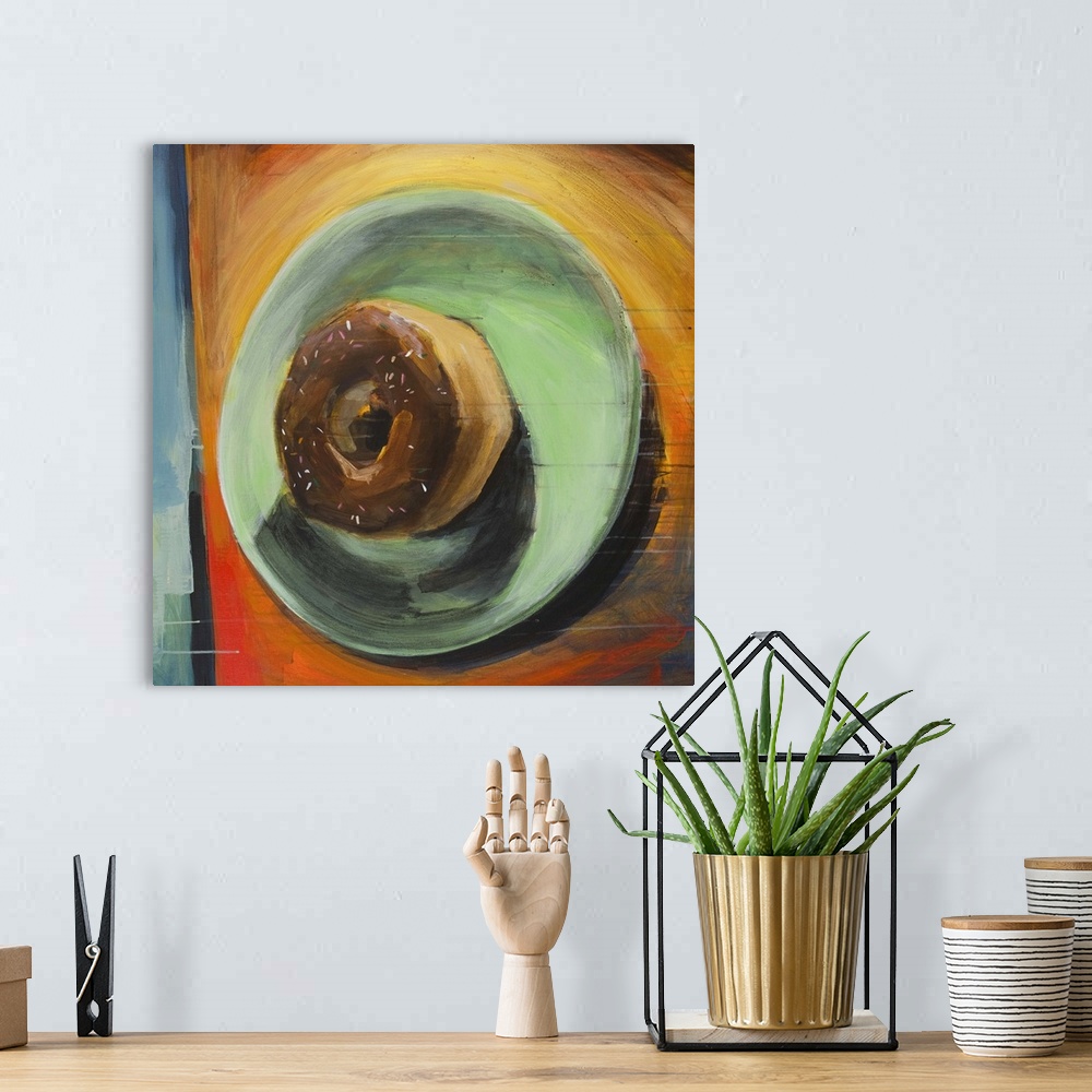 A bohemian room featuring Contemporary painting of a chocolate frosted donut on a green plate.