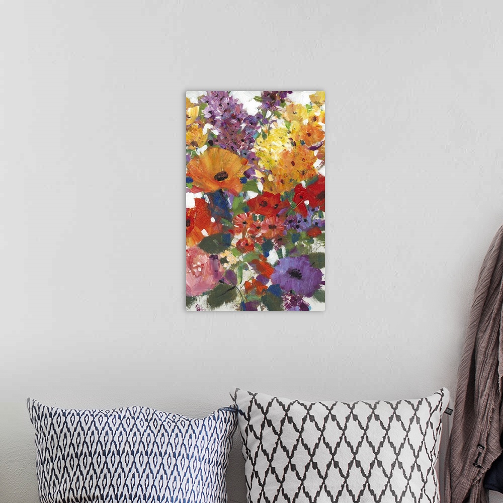 A bohemian room featuring Contemporary artwork of a rainbow colored bouquet of flowers.