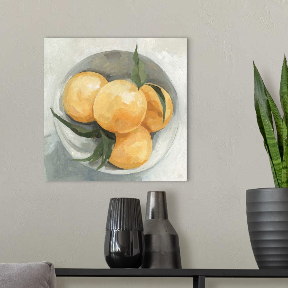 A modern room featuring A square contemporary painting of a gray bowl full of lemons.