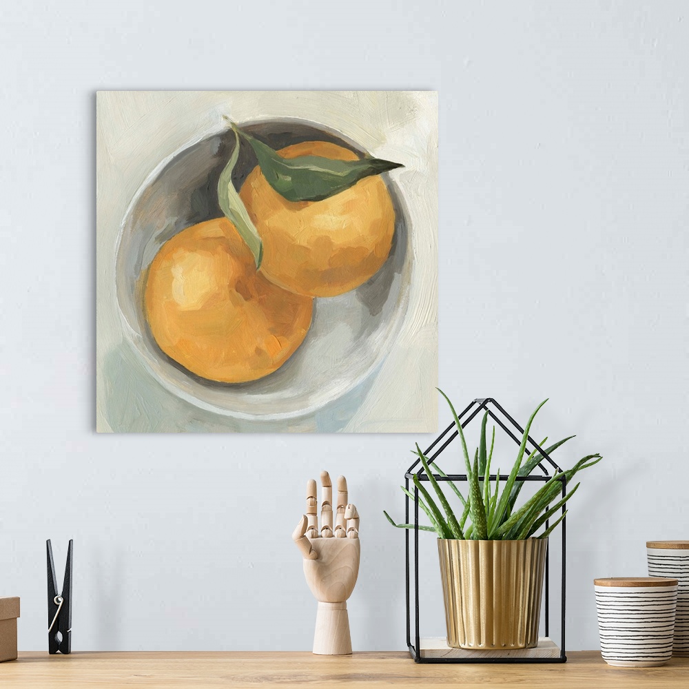 A bohemian room featuring A square contemporary painting of a gray bowl full of grapefruit.
