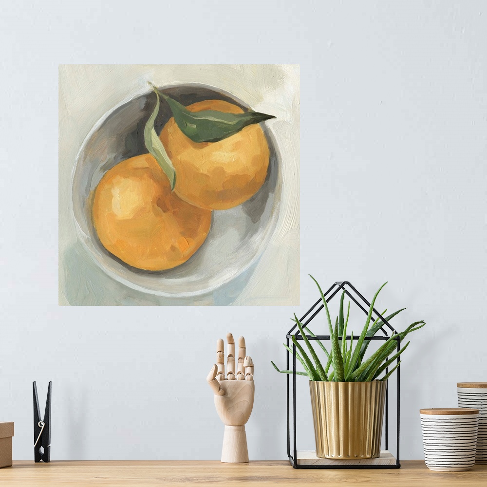 A bohemian room featuring A square contemporary painting of a gray bowl full of grapefruit.