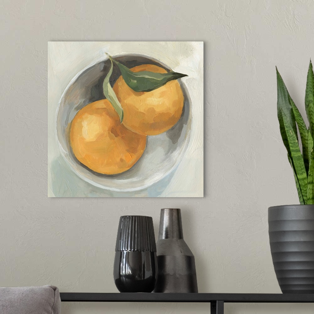 A modern room featuring A square contemporary painting of a gray bowl full of grapefruit.