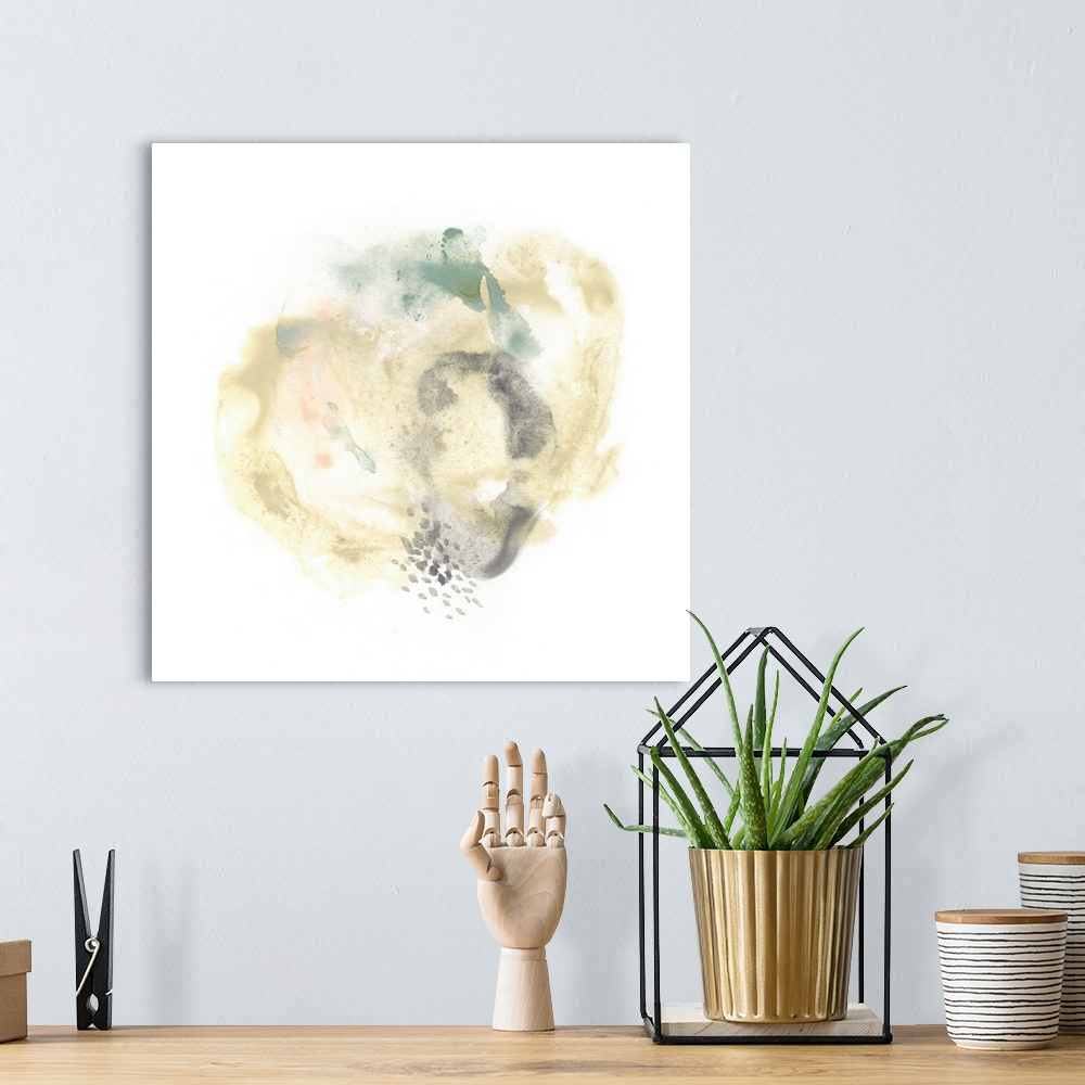 A bohemian room featuring Abstract watercolor painting in a round organic shape in grey and pale yellow-green.