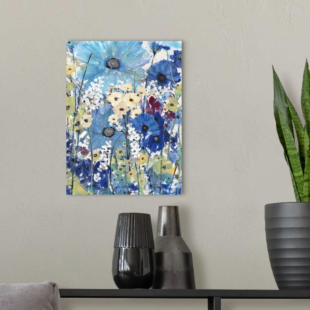 A modern room featuring Artistic painting of a garden of wild flowers in shades of blue, yellow and purple.