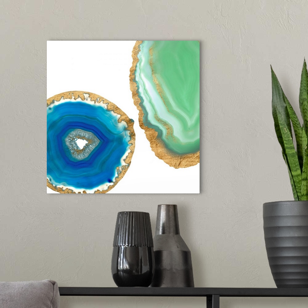 A modern room featuring Decorative square art with blue and green agate that has a metallic gold outline, on a white back...