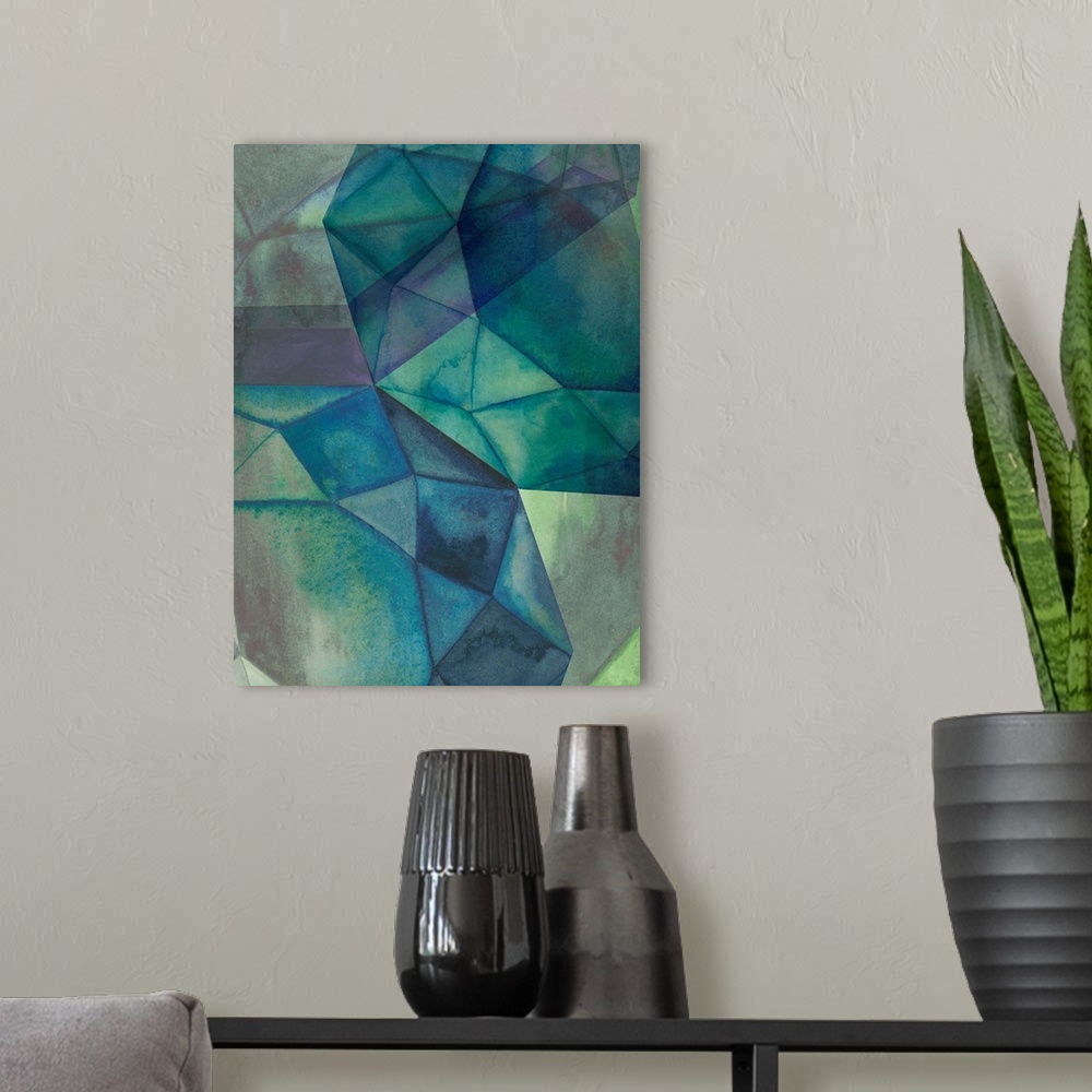 A modern room featuring Contemporary home decor artwork of geometric shapes in green sea-like tones.