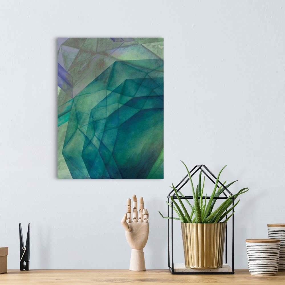 A bohemian room featuring Contemporary home decor artwork of geometric shapes in green sea-like tones.