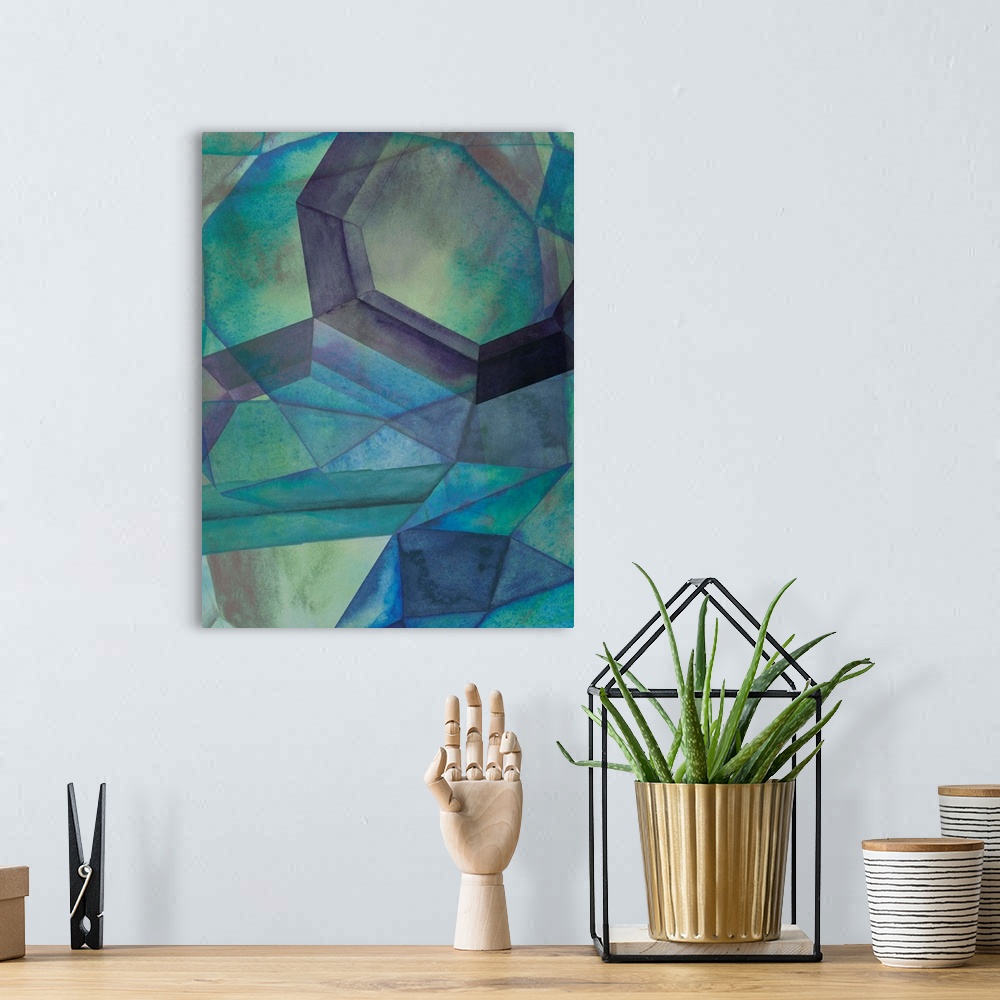 A bohemian room featuring Contemporary home decor artwork of geometric shapes in green sea-like tones.