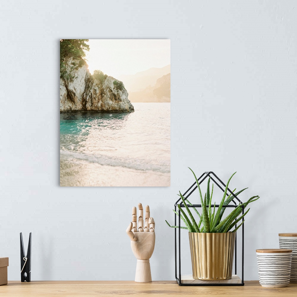 A bohemian room featuring Photograph of gentle waves lapping the shore of Corfu Island, Greece.