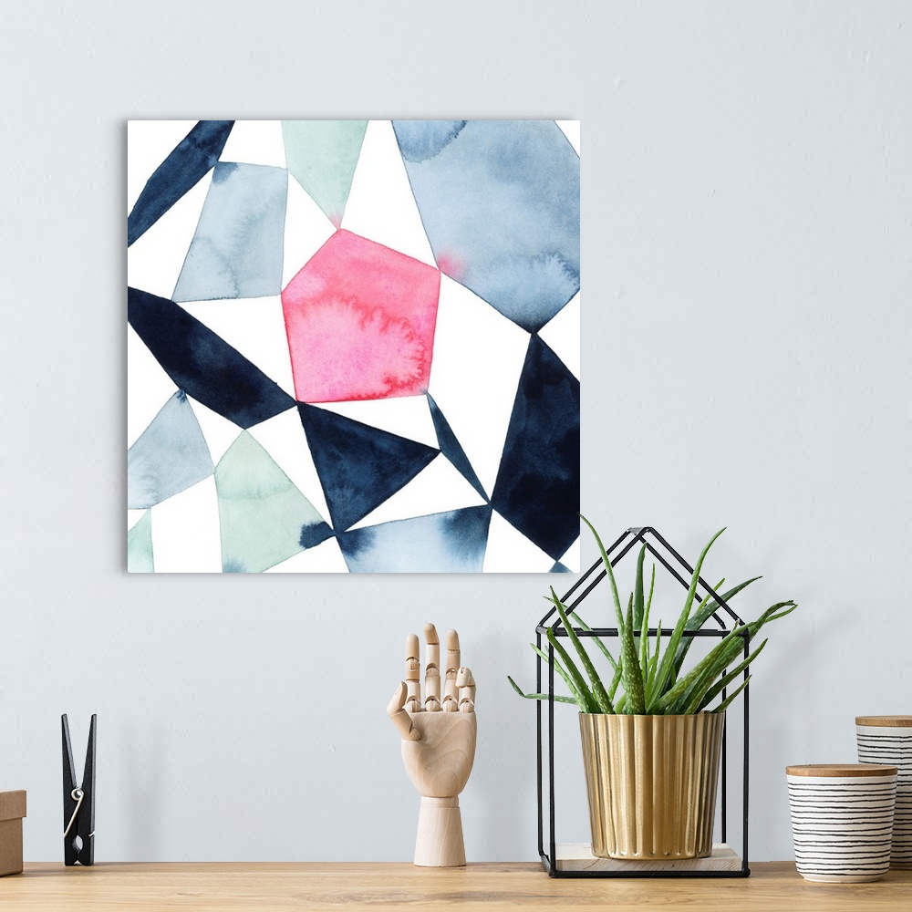 A bohemian room featuring Modern watercolor painting of blended colors in geometric shapes connecting on a white background.