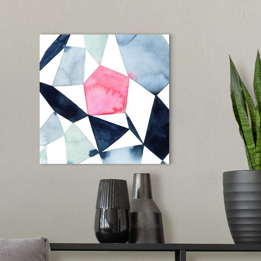 A modern room featuring Modern watercolor painting of blended colors in geometric shapes connecting on a white background.