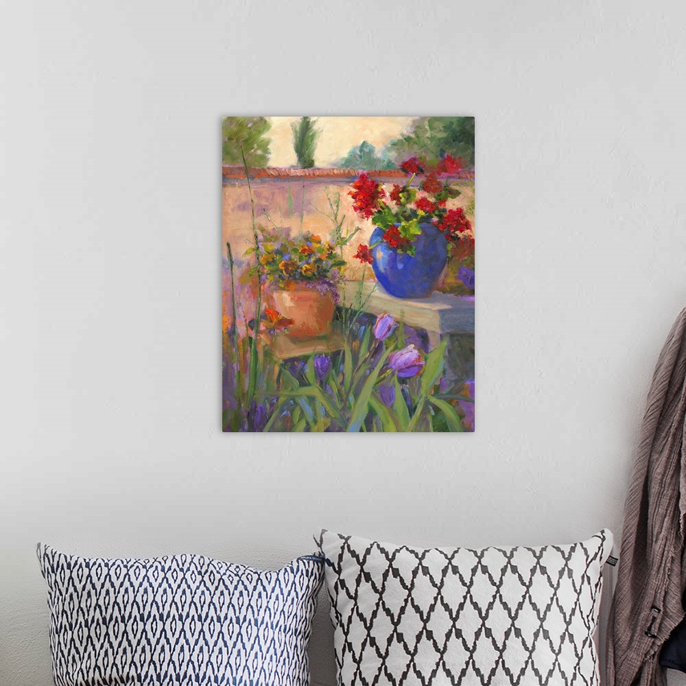 A bohemian room featuring Still life painting of two potted flowers on benches in a walled garden.