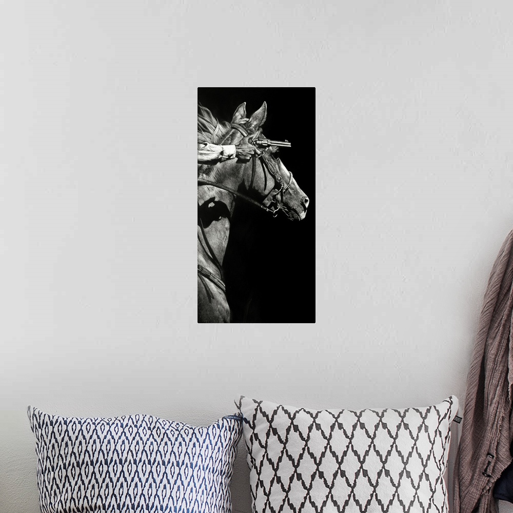 A bohemian room featuring Black and white realistic sketch of a cowboy pointing a gun on horseback.