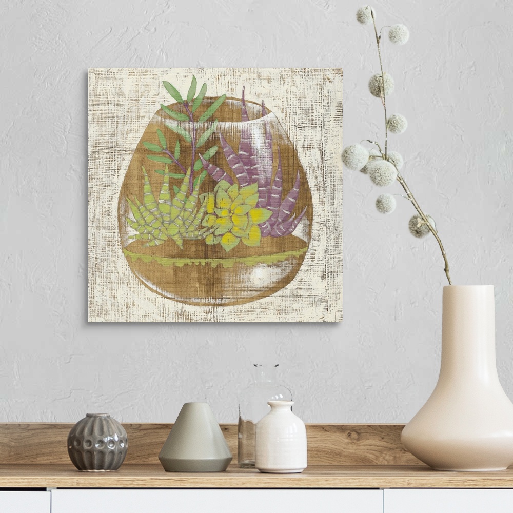 A farmhouse room featuring Square decor with a painted illustration of succulents inside a glass container.