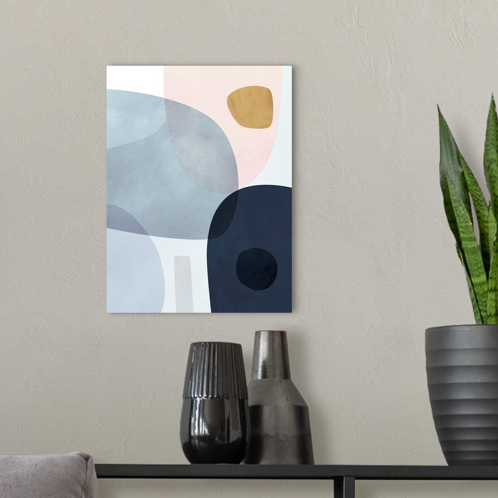 A modern room featuring Contemporary abstract painting with large shapes in blue and pink.