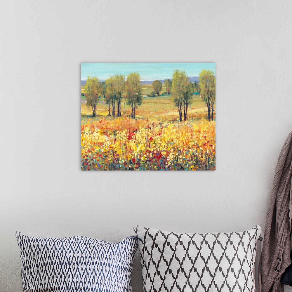 A bohemian room featuring Contemporary landscape painting containing bright colors in crosshatched brush strokes with dots ...
