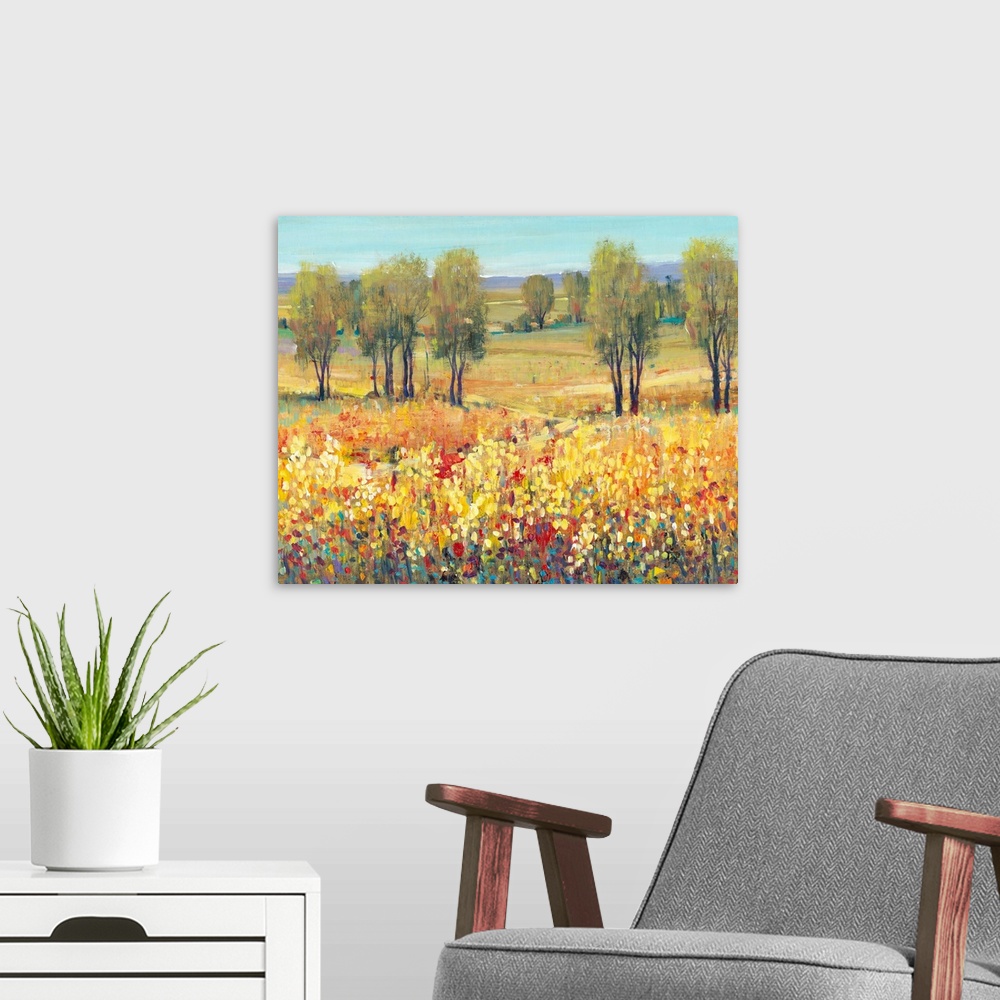 A modern room featuring Contemporary landscape painting containing bright colors in crosshatched brush strokes with dots ...