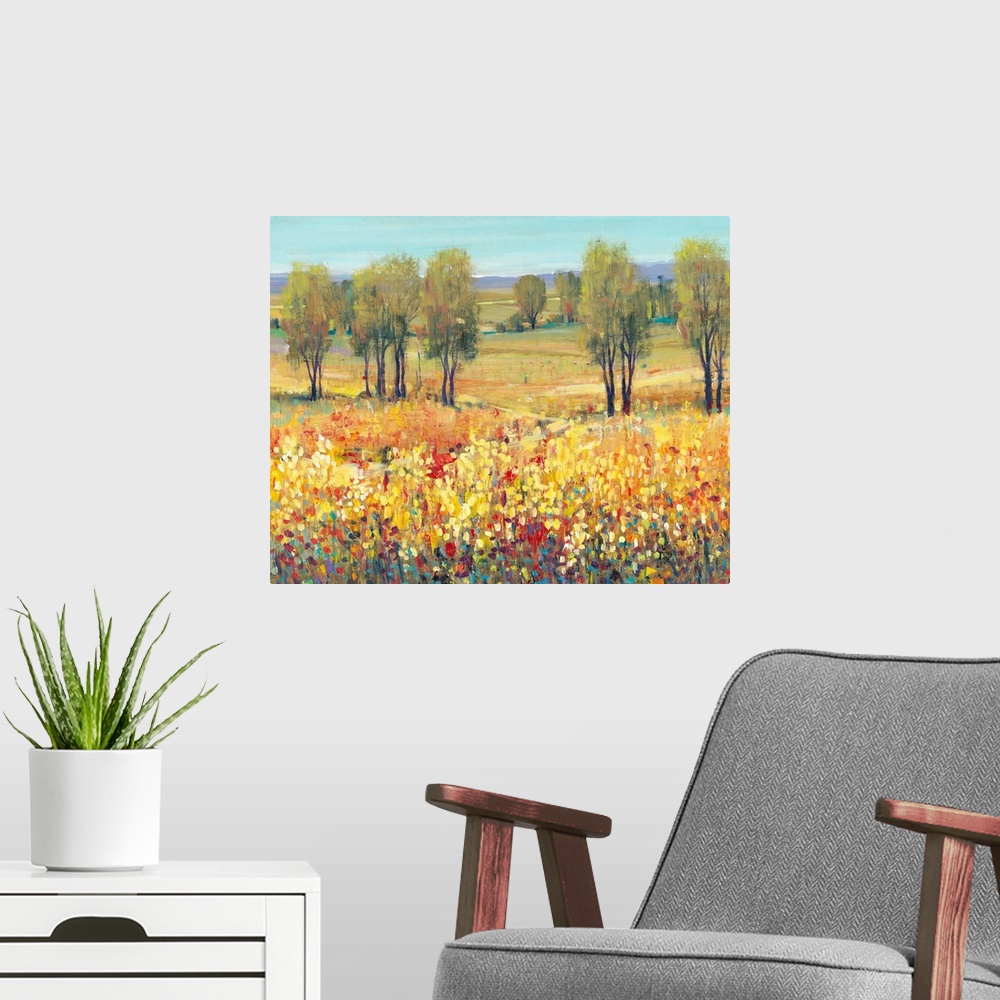 A modern room featuring Contemporary landscape painting containing bright colors in crosshatched brush strokes with dots ...