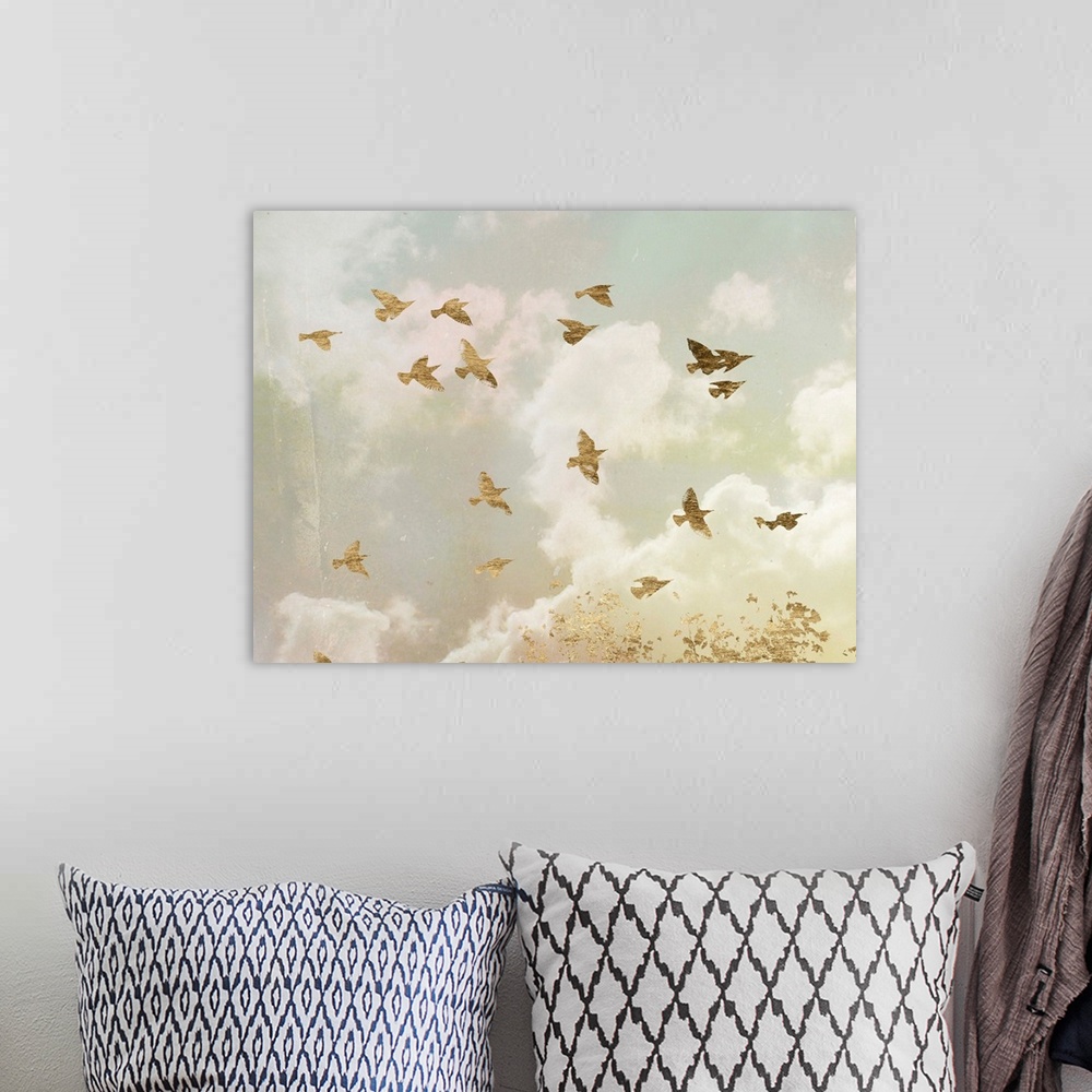 A bohemian room featuring Gold birds in flight in a cloudy sky with bright sunlight.