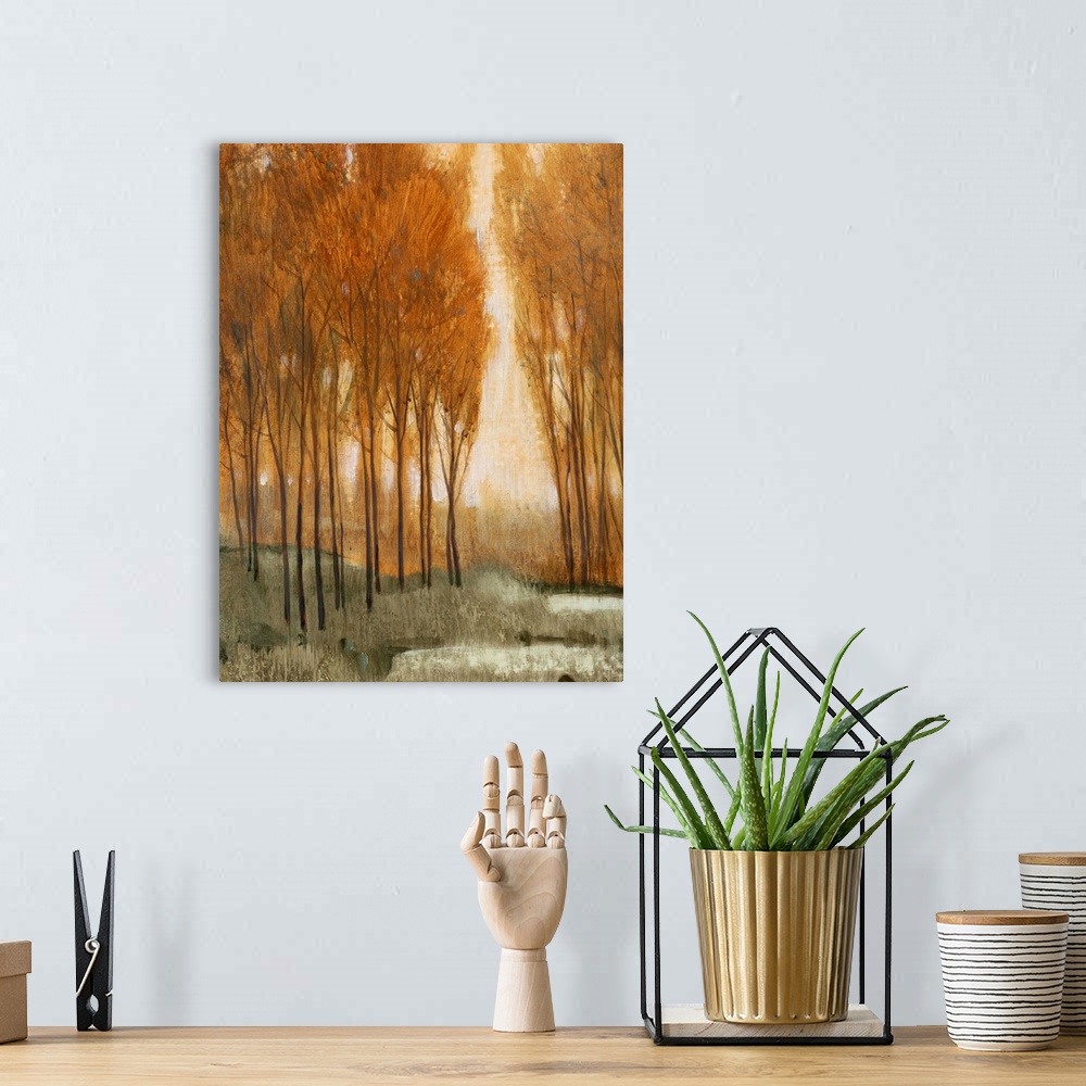 A bohemian room featuring A painting looking through a narrow arch to a clearing in a forest.