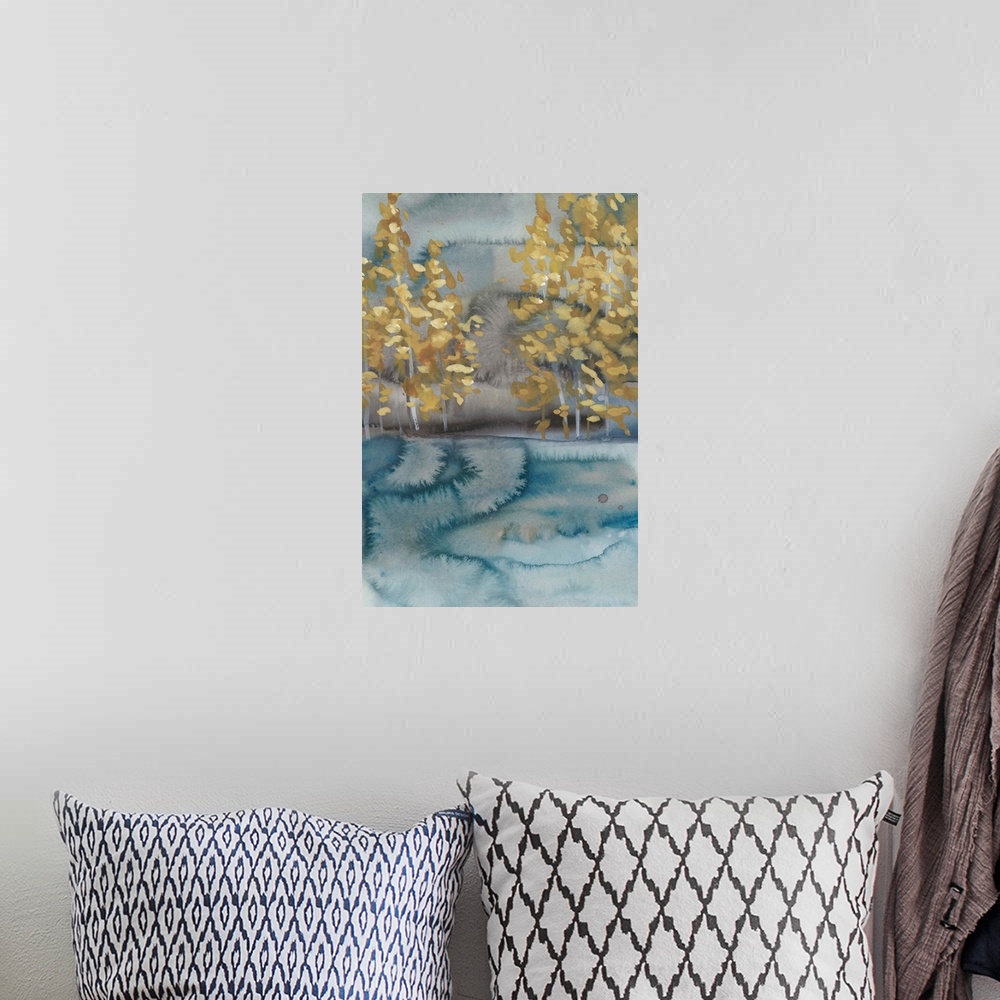 A bohemian room featuring Abstract watercolor landscape in blue and gray with golden trees.