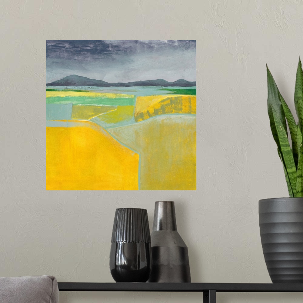 A modern room featuring Abstract landscape painting using vibrant yellow in the foreground of the image.