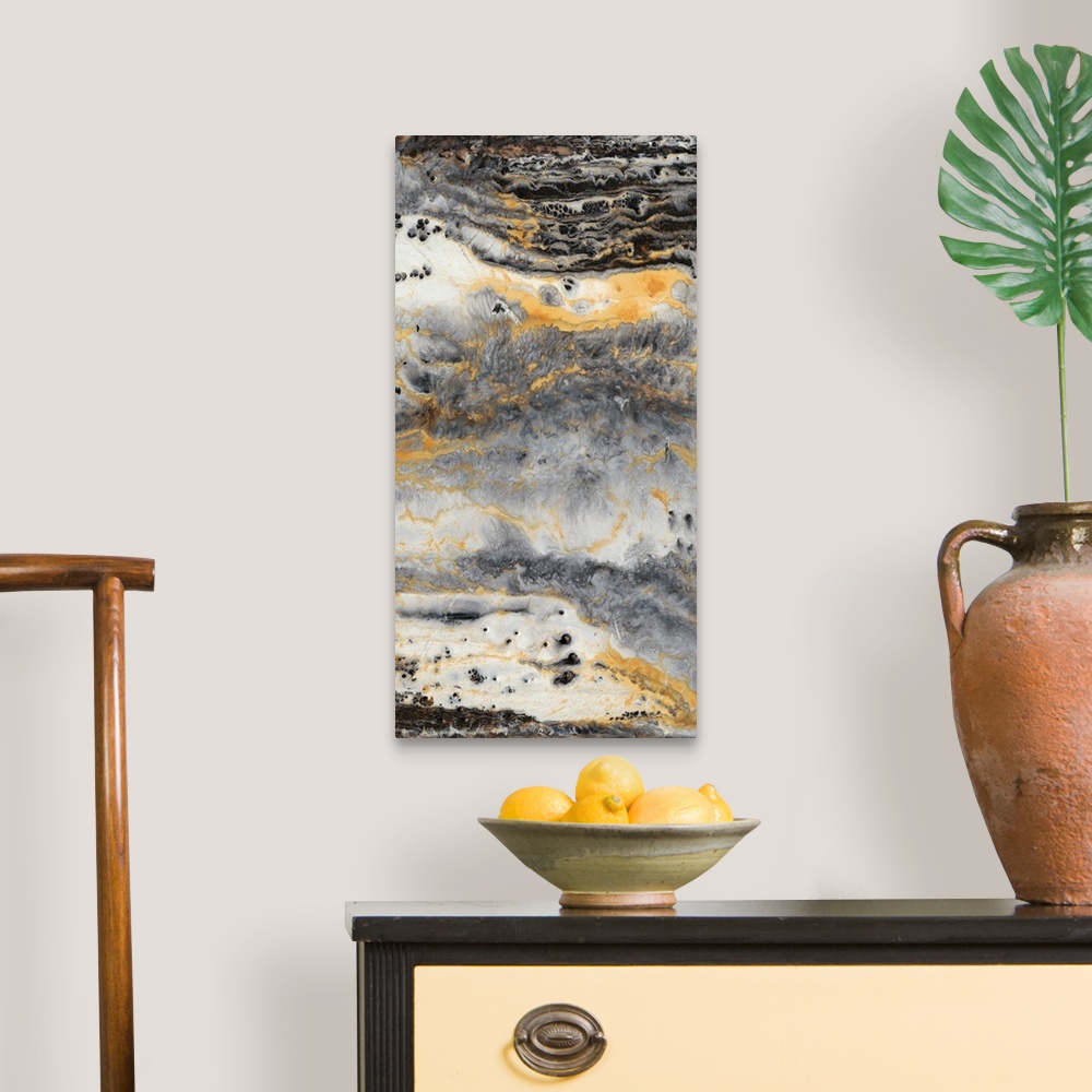 A traditional room featuring Contemporary abstract artwork in earth tones resembling layers of sediment in rock.