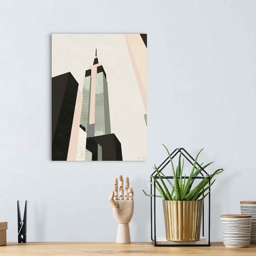 A bohemian room featuring Minimalist geometric artwork in black and pale pink of the stylized Empire State Building.