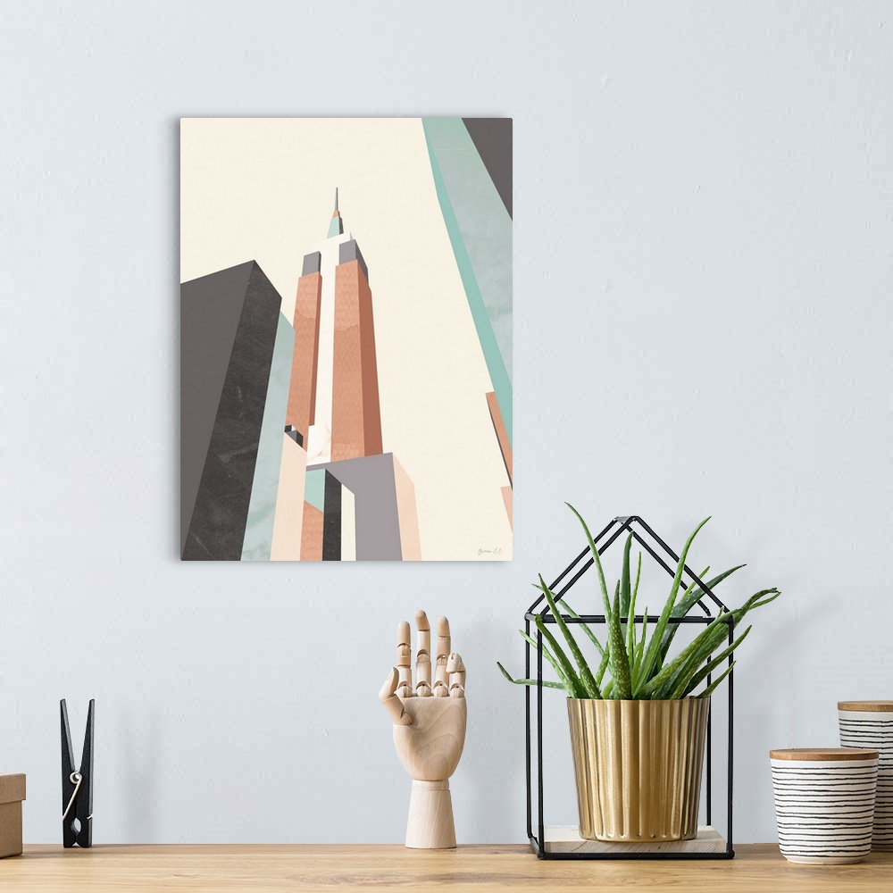 A bohemian room featuring Minimalist geometric artwork in blue and coral of a stylized Empire State Building.