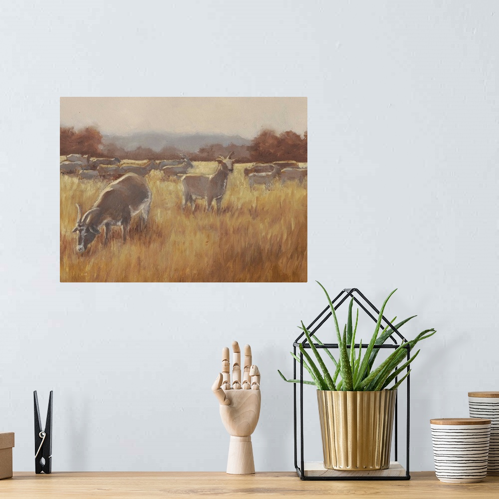 A bohemian room featuring A contemporary horizontal painting of a group of goats in a field with one goat looking toward th...