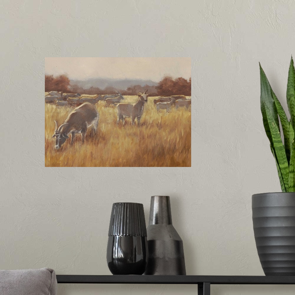 A modern room featuring A contemporary horizontal painting of a group of goats in a field with one goat looking toward th...