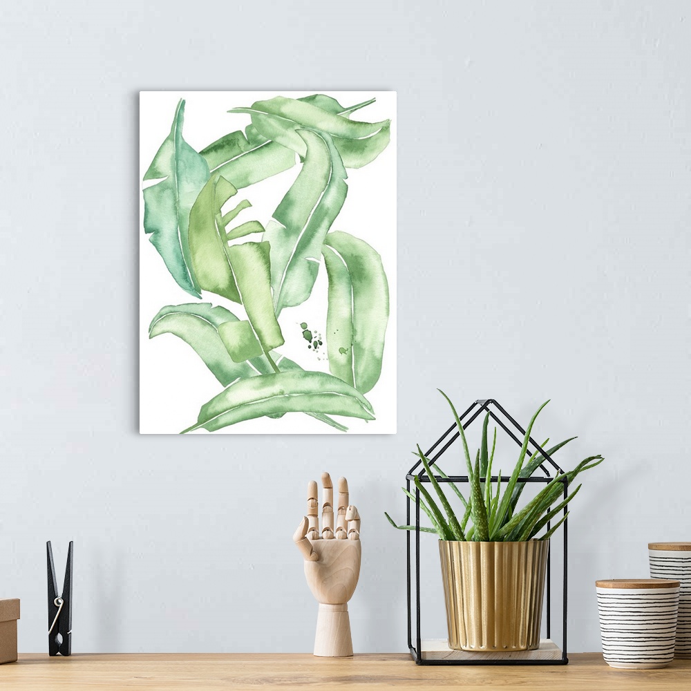 A bohemian room featuring This contemporary artwork features playful green watercolor leaves against a white background wit...