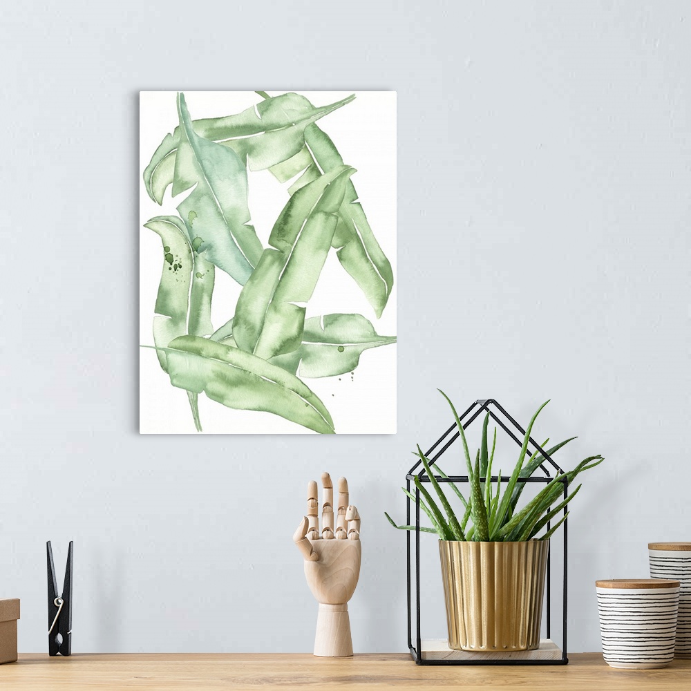A bohemian room featuring This contemporary artwork features playful green watercolor leaves against a white background wit...