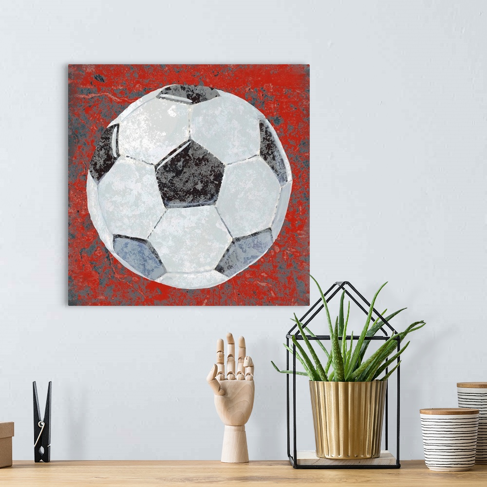 A bohemian room featuring Square sports decor with an illustration of a soccer ball on a red and gray textured background.