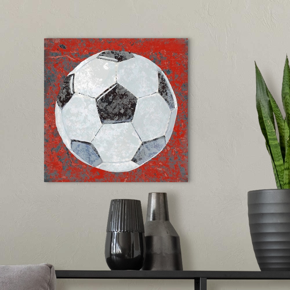 A modern room featuring Square sports decor with an illustration of a soccer ball on a red and gray textured background.