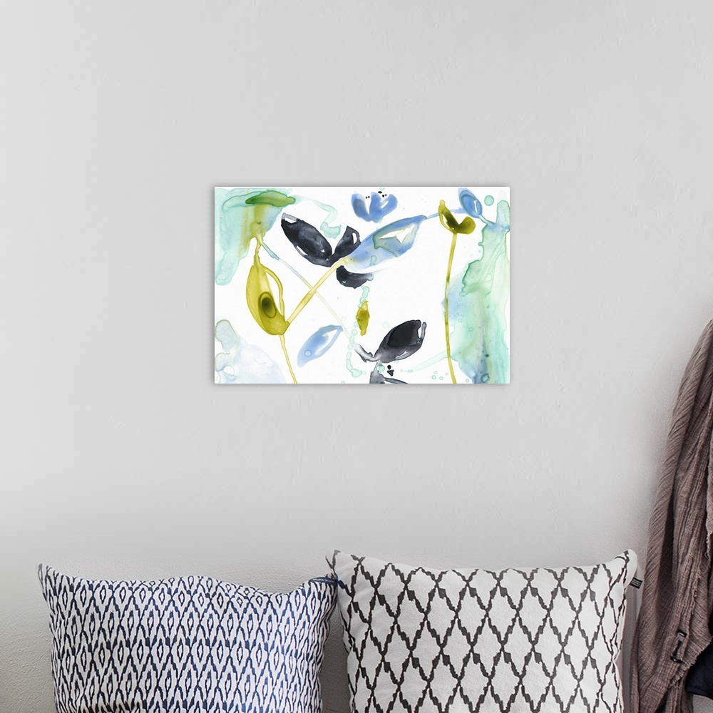 A bohemian room featuring Watercolor painting of flowers and leaves in yellow, black, and blue, on white.