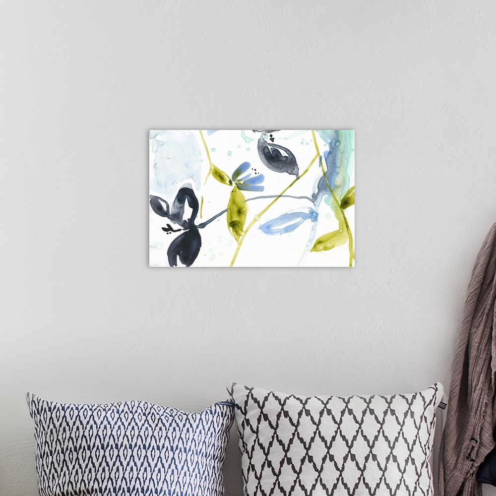 A bohemian room featuring Watercolor painting of flowers and leaves in yellow, black, and blue, on white.