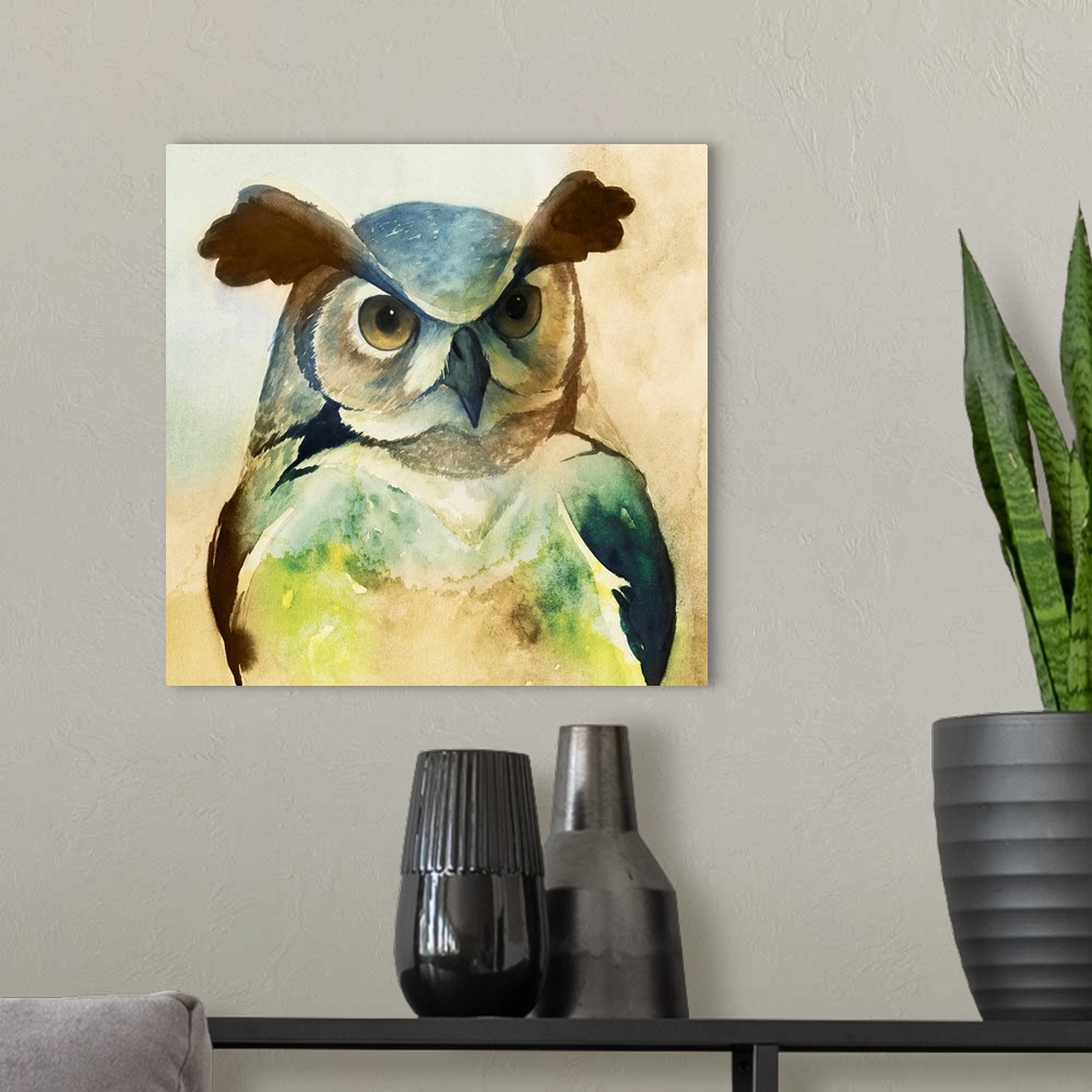 A modern room featuring Watercolor painting of an owl in pale and vibrant green tones.