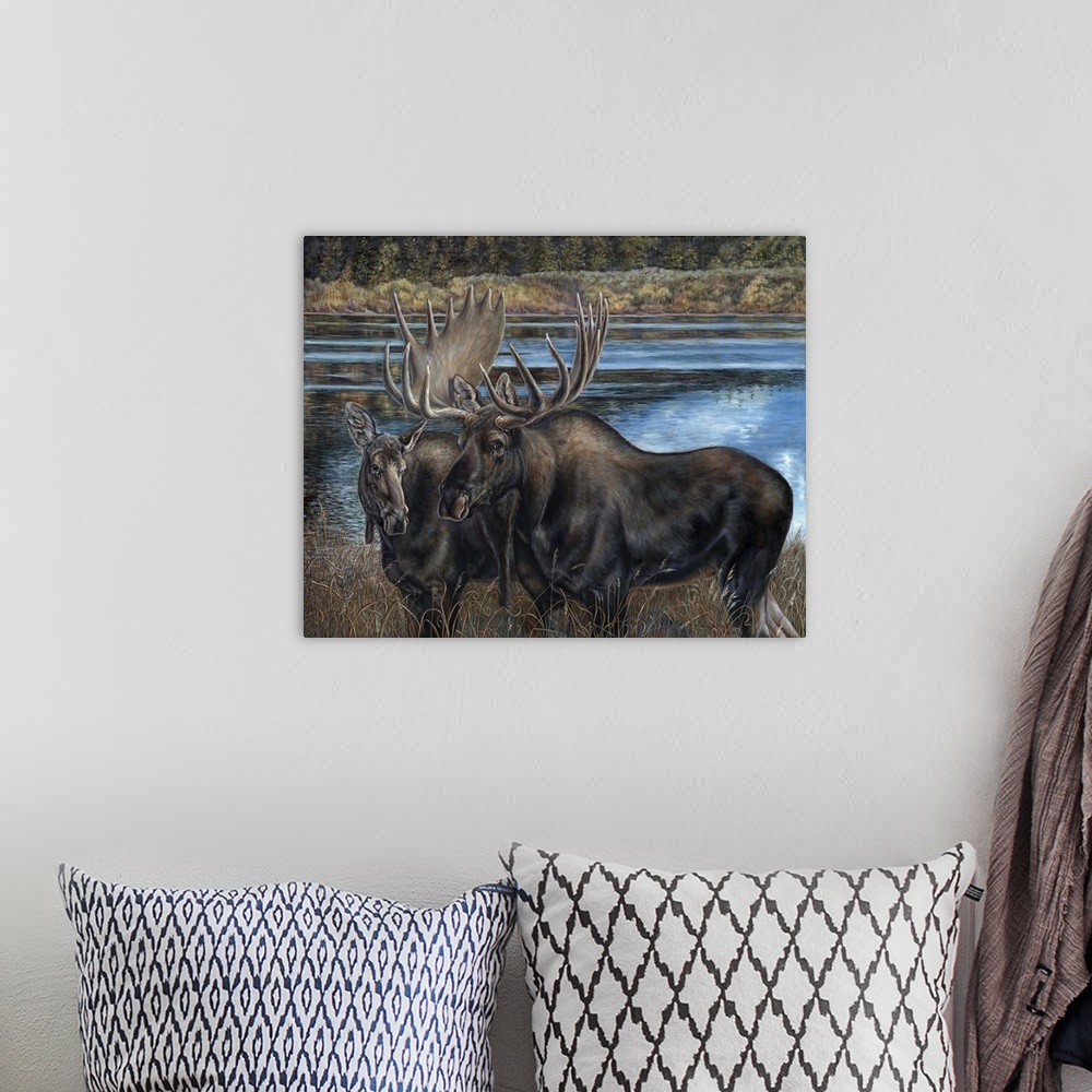 A bohemian room featuring Contemporary painting of a male and female moose beside a river.