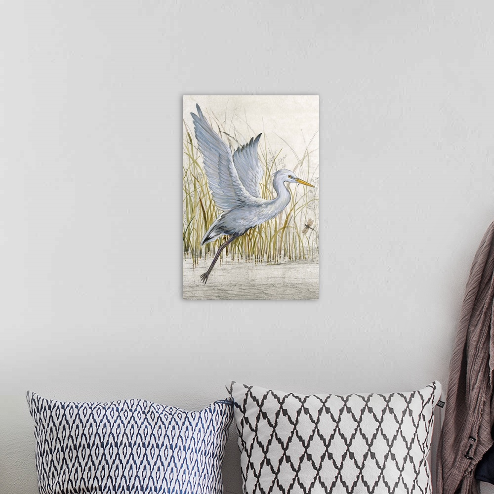 A bohemian room featuring Contemporary artwork of a heron about to take off into flight.