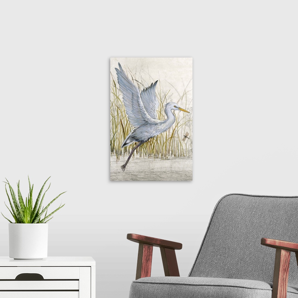 A modern room featuring Contemporary artwork of a heron about to take off into flight.