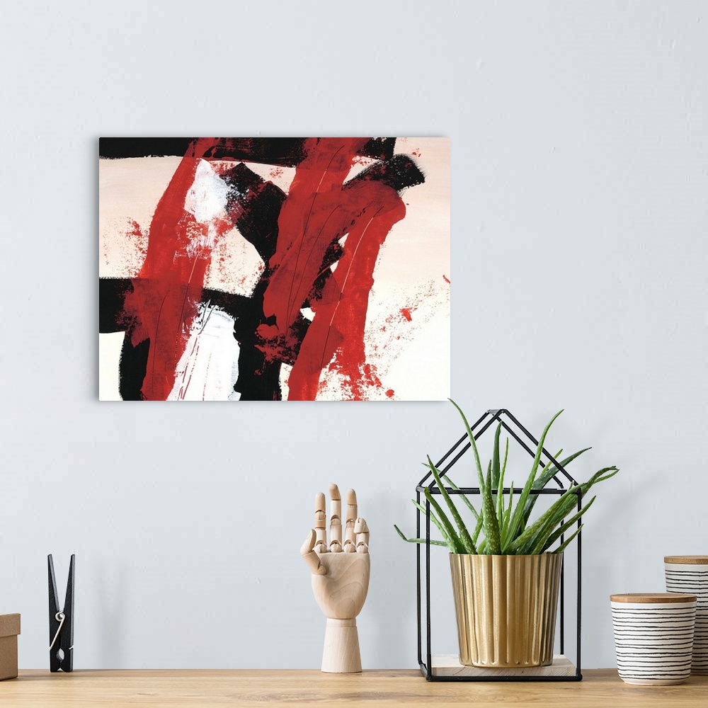 A bohemian room featuring Bold abstract painting in red, white, and black, with broad brushstrokes.