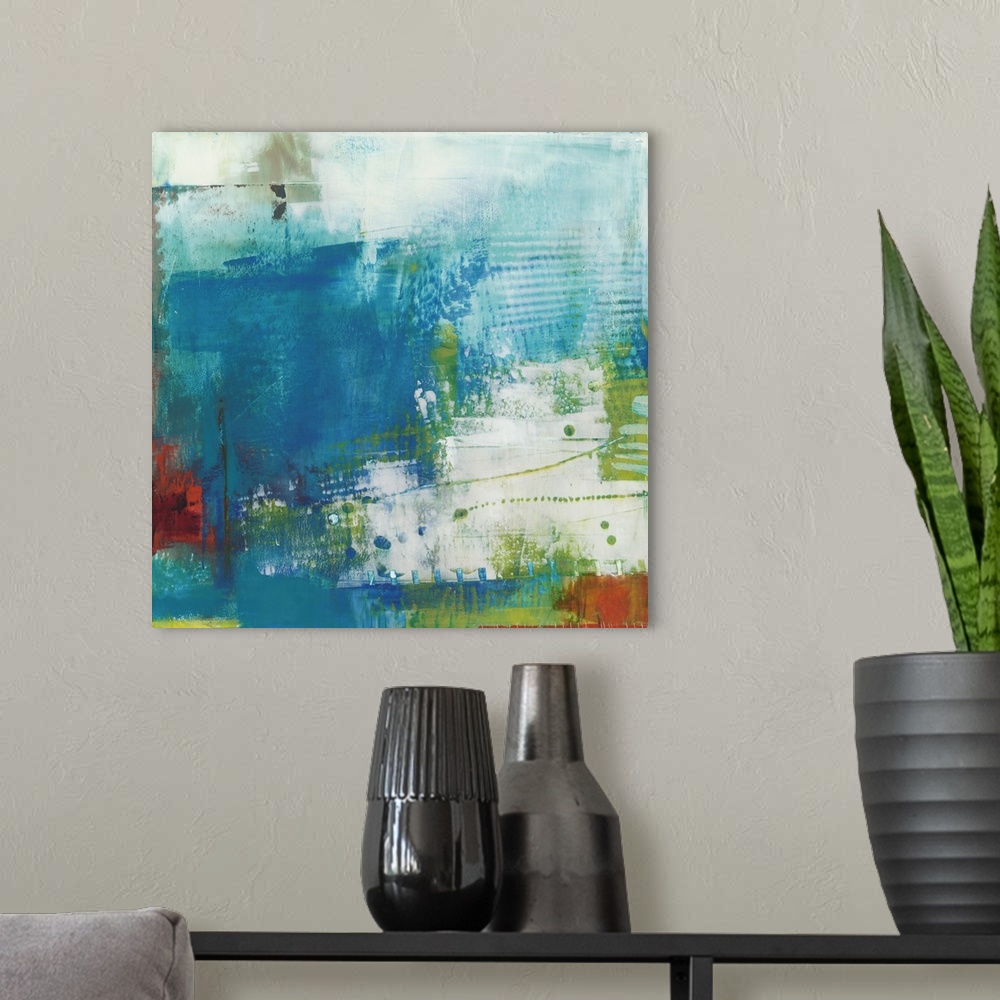 A modern room featuring Abstract contemporary painting in cool shades of deep blue and green.