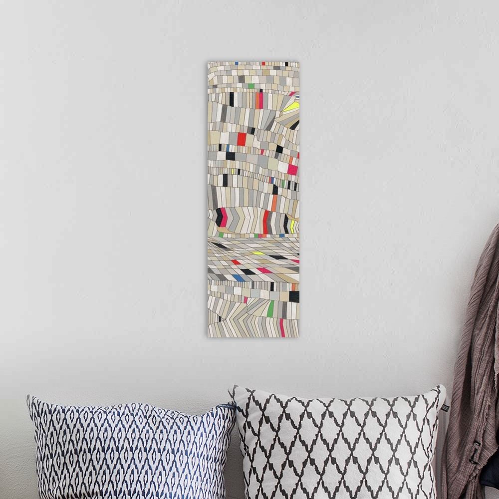 A bohemian room featuring Abstract artwork of layers of colorful blocks.