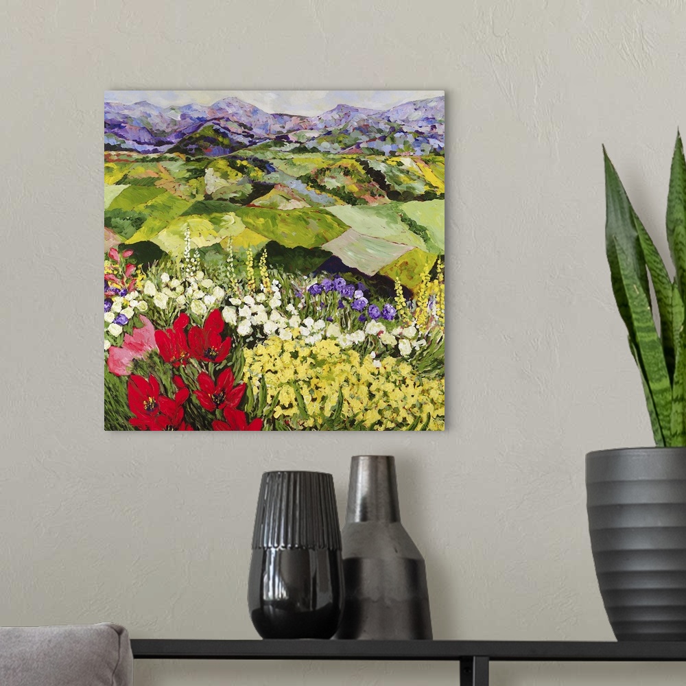 A modern room featuring Contemporary painting of a country landscape with lots of colorful flowers and fields of growing ...