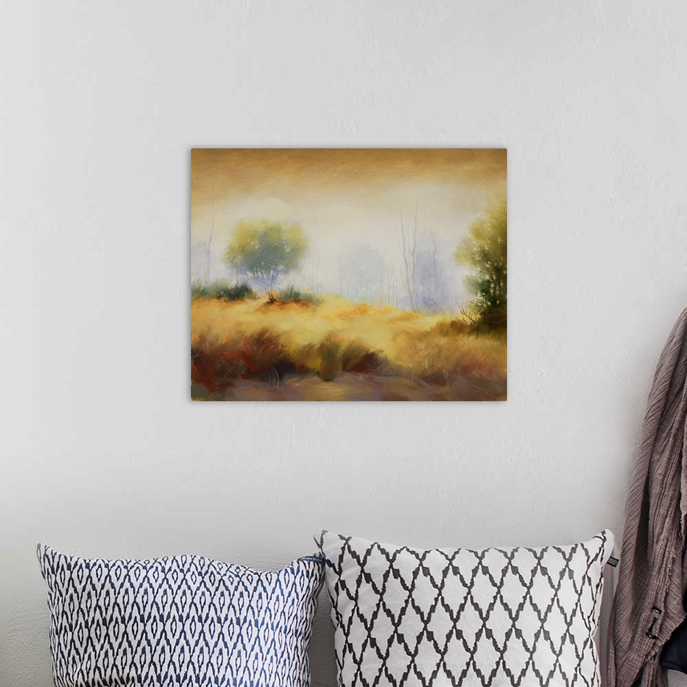 A bohemian room featuring Contemporary painting of a misty meadow with trees along the edge.